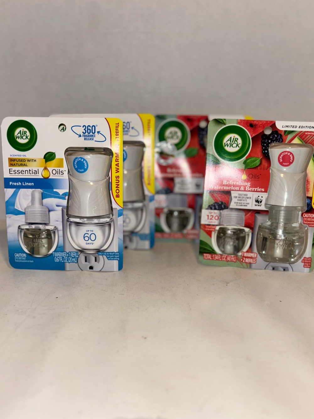 Air Wick Plug-In Oil Warmer with Fresh Linen & Watermelon Berries Bundle of 4